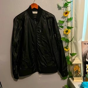 brand is five four, size medium/large, black faux leather